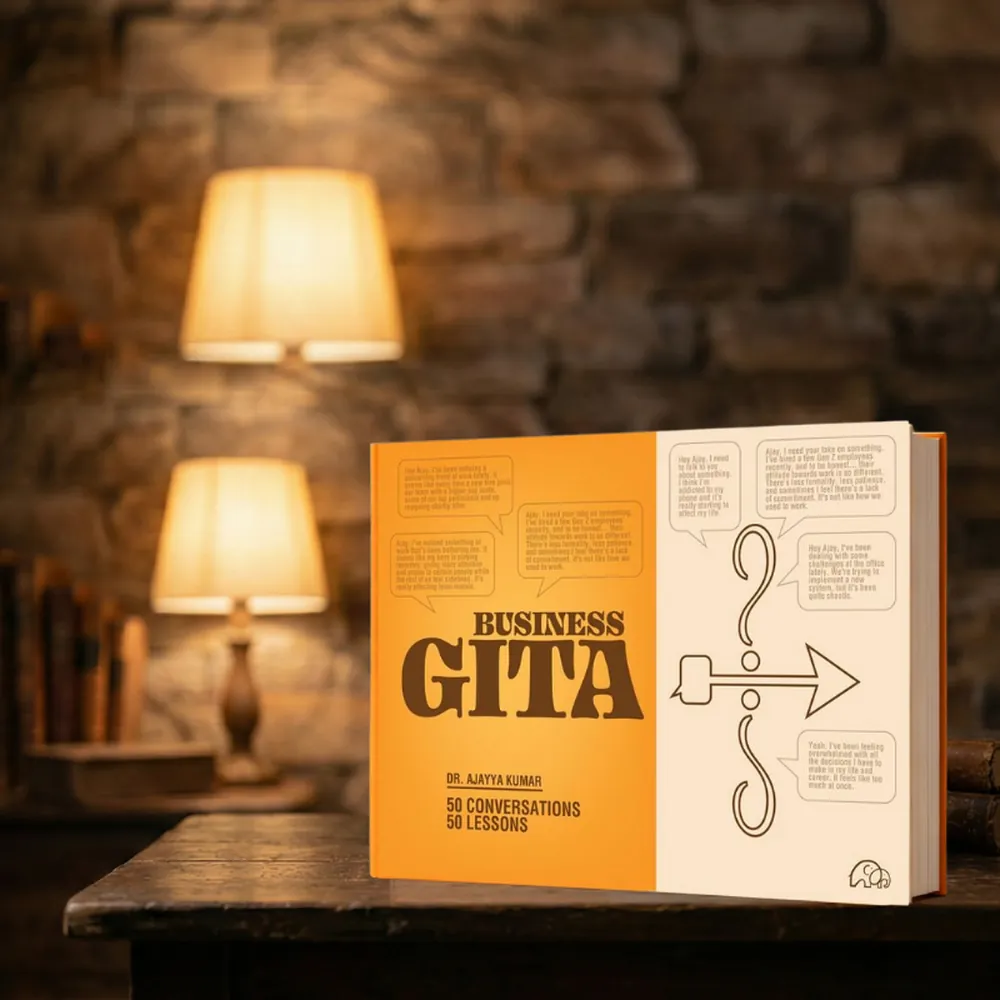Business Gita 3.0 on a table against a stone wall